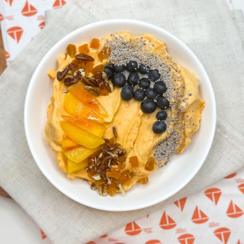 Creamy orange foods smoothie bowl