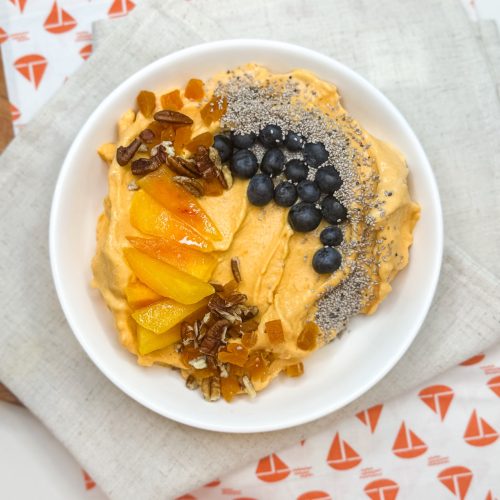 Creamy orange foods smoothie bowl